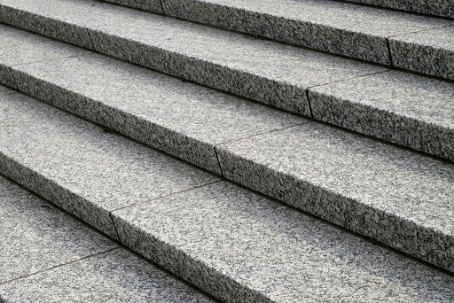 Diagonal close up of granite stairs as a background